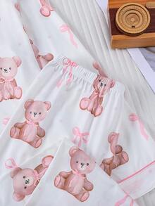 Set de 2 piezas Pijama infantil con estampado de oso de dibujos animados y lazo, camisa de cuello de cárdigan y pantalones de cintura elástica holgados, estampado adorable de oso rosa y lazo, adecuado para uso diario y ropa de estar en casa de niños y adolescentes