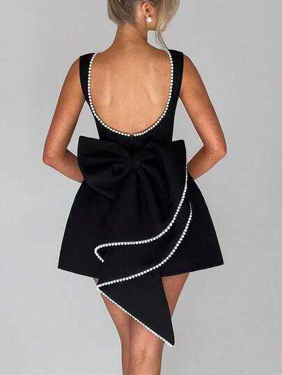 Sedessea 女式短款连衣裙，背面饰有蝴蝶结和珍珠