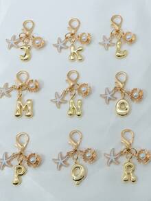 1个A-Z金色泡泡字母可爱吊坠，蝴蝶结装饰，钥匙扣，戒指托，背包挂饰，汽车挂饰，购物，海滩，露营，钱包配饰。适合作为送给女性、朋友和学生的礼物，时尚创意设计，生日礼物装饰，圣诞礼物。 - 金色蝴蝶結 - 查看 2