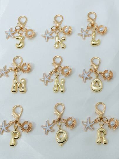 1pc A-Z Gold Bubble Letter Cute Pendant, Bow Decor, Keychain, Ring Holder, Backpack Charm, Car Charm, Shopping, Beach, Camping, Wallet & Purse Accessory. Suitable As Gift For Women, Friends And Students, Fashion Creative Design, Birthday Gift Decor, Christmas Gift.