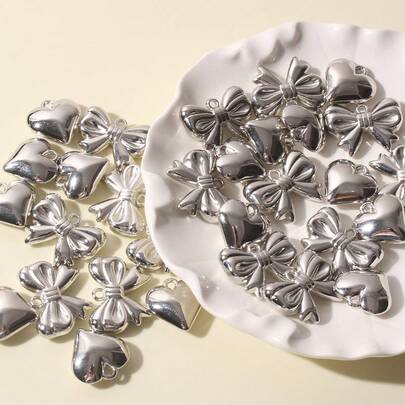 10个优雅银色蝴蝶结心形配件，手工DIY珠宝材料，可用于制作手链、项链、吊坠、钥匙扣等，创意手工装饰配件