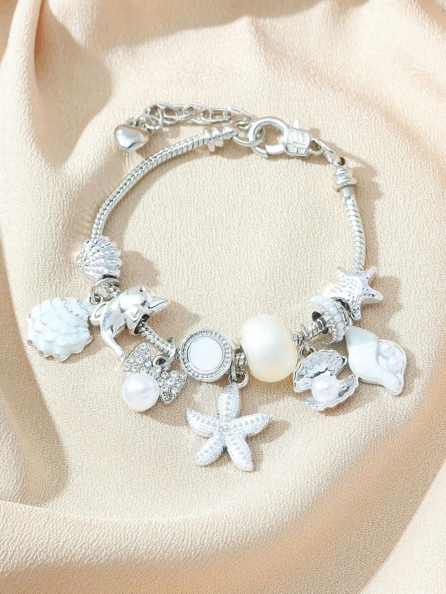 This Fashionable And Unique Handmade Beaded Bracelet Is Decorated With Rhinestones, Seashells, Starfish, Faux Pearls, Stars, Whale Tails, And Sea Turtle Pendants, Designed Specifically For Women. It Features An Adjustable And Detachable Copper Chain, Making It Perfect For Wearing To The Beach, On Vacation, To Parties, For Casual Occasions, And Daily Wear. It Also Makes A Great Gift. - White Ocean Bracelet - View 1
