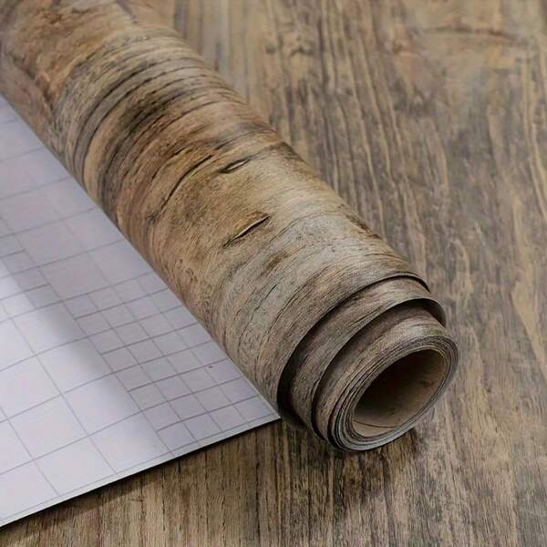 A Roll Of Wallpaper With A Dark Brown Wood Grain Pattern. It Is Durable, Peel-And-Stick, Removable, And Easy To Install. Suitable For Decorating Bedroom And Living Room Feature Walls, Refurbishing Desktops And Outdoor Gardens, As Well As Creating Festive Atmospheres.