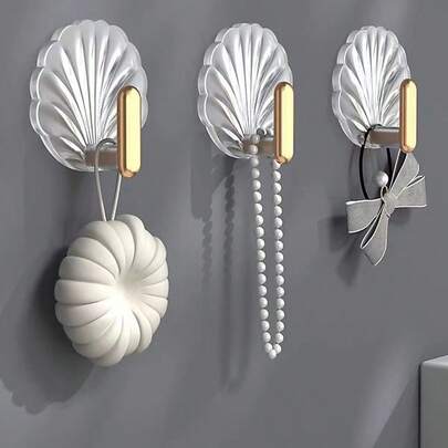 2/4 pièces Crochets muraux en forme de coquillage, imperméables et auto-adhésifs, polyvalents pour accrocher serviettes, clés, manteaux, chapeaux, sacs et accessoires dans la cuisine, la salle de bain, la chambre, l'entrée, la buanderie ; élégants, résistants à l'humidité, idéaux pour une rénovation printanière, installation facile, décoration côtière moderne