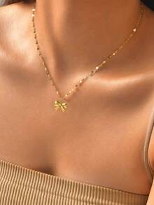 1 chiếc vòng cổ nơ xinh xắn bằng thép không gỉ, chống thấm nước và không phai màu, thích hợp cho nữ giới đeo hàng ngày. - Vàng - Xem 4