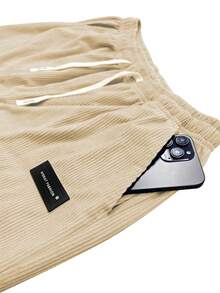 Nuovi pantaloni casual in velluto a coste da donna, di colore unito con tasche con laccetto, traspiranti e confortevoli, adatti per attività quotidiane