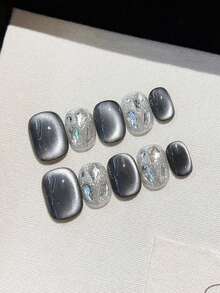 10片美甲贴纸，DIY超大猫眼星空图案，黑色可拆卸可重复使用指甲贴，适用于舞台、舞蹈、舞会、派对等场景。内含1盒指甲胶和1个指甲抛光器。按压式美甲用品