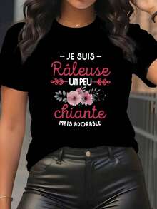 هذه القميص الصيفي للمرأة ذات الحجم الكبير يتميز بنمط زهور وأوراق رمادية لطيف وممتع باللون الوردي، ويوفر مظهرًا عفويًا ومريحًا مثاليًا للارتداء اليومي وإضفاء أجواء العطلة. - الأسود - مشاهدة 1