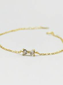 1 brățară din argint sterlin S925 cu fundă, pentru femei, încrustată cu diamante și cu un design de nișă. Are un stil modern și minimalist, potrivită pentru cele mai bune prietene și pentru asortarea zilnică a femeilor și, de asemenea, un cadou excelent pentru mame, surori și iubite.