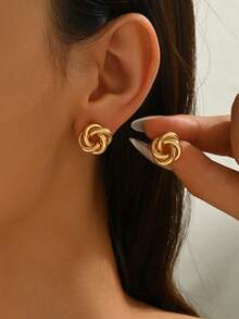 1 Paar einfache personalisierte Mode kreative Nischen Design Silber verdrillter Kreis Ohrstecker, geeignet für den täglichen Gebrauch für Frauen