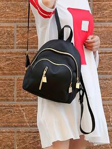 尼龙休闲背包，街头风格，拉链开合，涤纶衬里，多口袋旅行背包，带流苏细节，可调节肩带，适合外出，科技友好型手提包 | 街头风格背包，迷你背包旅行外出背包 - 黑色 - 查看 4