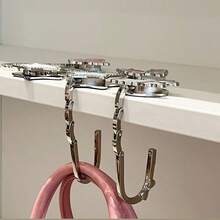 Móc treo đa năng có thể gập lại dùng để cất giữ đồ đạc trên cạnh bàn và là giá đỡ túi xách nhẹ, di động, giúp tiết kiệm không gian cho văn phòng tại nhà, phòng ký túc xá, nhà bếp và khi đi du lịch. Giúp giữ chặt ví, ba lô, bóp và các vật dụng nhỏ trên các bề mặt cạnh mà không cần keo dán. Thiết kế kẹp dễ dàng, cấu trúc nhẹ nhưng bền chắc, lý tưởng cho mùa xuân và lễ Phục sinh, quà tặng Ngày của Mẹ. - Nhiều màu - Xem 7