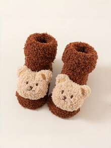 1 paire de chaussures épaisses et chaudes pour bébé et tout-petit, chaussettes intérieures antidérapantes pour nouveau-né et nourrisson avec motif de personnage de dessin animé, à semelle souple, convient pour la maison, les fêtes et l'hiver