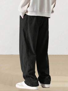 1条男士灯芯绒抽绳阔腿休闲运动裤，适合户外活动