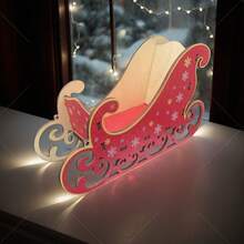 Ein hölzerner 3D handgefertigter Mini-Weihnachtsschlitten, geeignet für die Tischdekorationen.