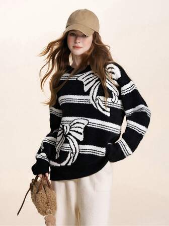 复古高端黑色蝴蝶结条纹撞色罗纹针织套头衫女休闲宽松长袖针织上衣秋冬