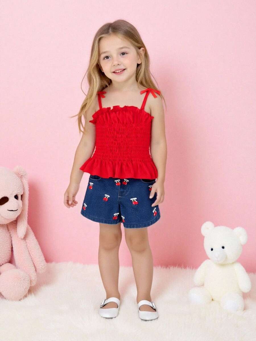 Conjunto de verano de estilo joven para niñas, top de tirantes con lazo 3D rojo + shorts de mezclilla con bordado de cerezas, adecuado para uso casual diario - Rojo - Ver 1