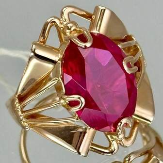 Vintage Copper-Tone Ring With Oval Synthetic Red Zirconia Stone