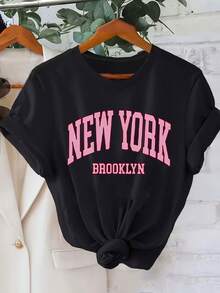 Camiseta informal estampada para mujer de talla grande, manga corta con cuello redondo, corte holgado, tejido lavable a máquina, material de elasticidad media. - Negro - Ver 2