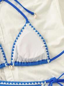 Bộ đồ bơi 2 mảnh này bao gồm một áo bikini hai dây in họa tiết màu trơn dễ thương và một quần bơi quyến rũ, hoàn hảo cho kỳ nghỉ hè ở bãi biển hoặc trang phục đi biển thường ngày. - Màu xanh lam - Xem 7