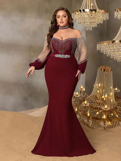 Faeriesty 这款优雅的大码正式晚礼服采用长袖和挂脖领设计，通体饰有水晶亮片，修身剪裁，背部拉链闭合，适合盛大晚宴、婚礼招待会、红毯活动、歌剧之夜和豪华慈善晚宴等场合。