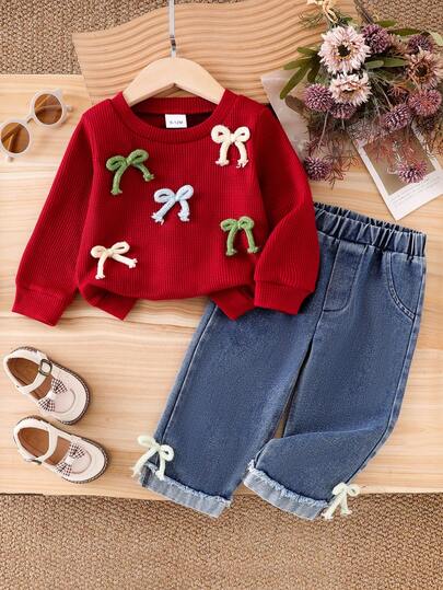 2 pezzi Set casual per bambina, include maglietta a maniche lunghe con collo rotondo e decorazione fiocco 3D, e jeans in vita elastica con bordi di polsini con fiocco 3D, adatto per primavera e autunno