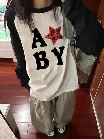 女士宽松休闲百搭字母和星星印花插肩袖撞色卡通印花长袖T恤