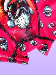 Cadouri de Crăciun cool de lenjerie intimă cu Moș Crăciun, chiloți bărbătești pentru iubitul sau membrii familiei. Acesta este un cadou de bun venit de Crăciun. Este o pereche de chiloți lungi bărbătești care pot fi purtați afară. Atât adulților, cât și copiilor le plac o pereche de lenjerie intimă.