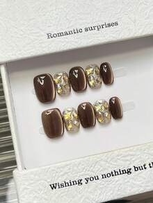 10 piezas de uñas postizas cuadradas hechas a mano, uñas marrones deslumbrantes con efecto de ojo de gato, con gemas de diamante y piedras en forma de estrella incrustadas, con polvo brillante, de estilo lujoso y elegante, adecuadas para fiestas, uso diario y citas, aptas para vacaciones en la playa y tropicales, reutilizables, como regalo para mujeres y niñas, suministros de uñas - Marrón - Ver 6