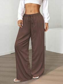 飘逸阔腿裤：轻盈梭织面料搭配弹力抽绳腰带，修身显瘦，是通勤、购物和居家休闲的必备单品。新款春秋季女士休闲裤，适合约会、学生和日常出行。百搭风格，休闲、海滩等场合皆可穿着。抽绳腰带设计，适合外出和居家穿着。 - 咖啡棕 - 查看 7
