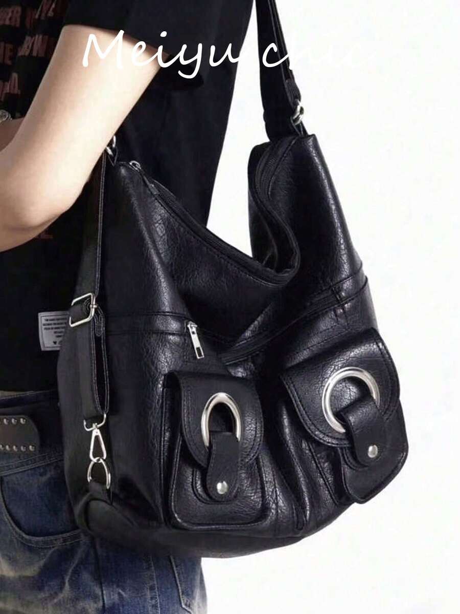 这款时尚简约的大容量女士通勤单肩包采用PU材质，配有镂空铆钉拉链，并附带双肩带和手提带。它适合旅行、通勤和学生使用，既可作为旅行背包，也可作为休闲背包。 - 黑色 - 查看 1