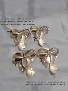 1pc Metal Bowknot Styled Back Adhesive Phone Stand With Pop-Up Airbag Design For Binge-Watching Compatible With IPhone, Android Phone, Gift For Birthday, Family, Friends Push-Pull Phone Grip, Phone Holder, Phone Accessories - Multicolor - View 9