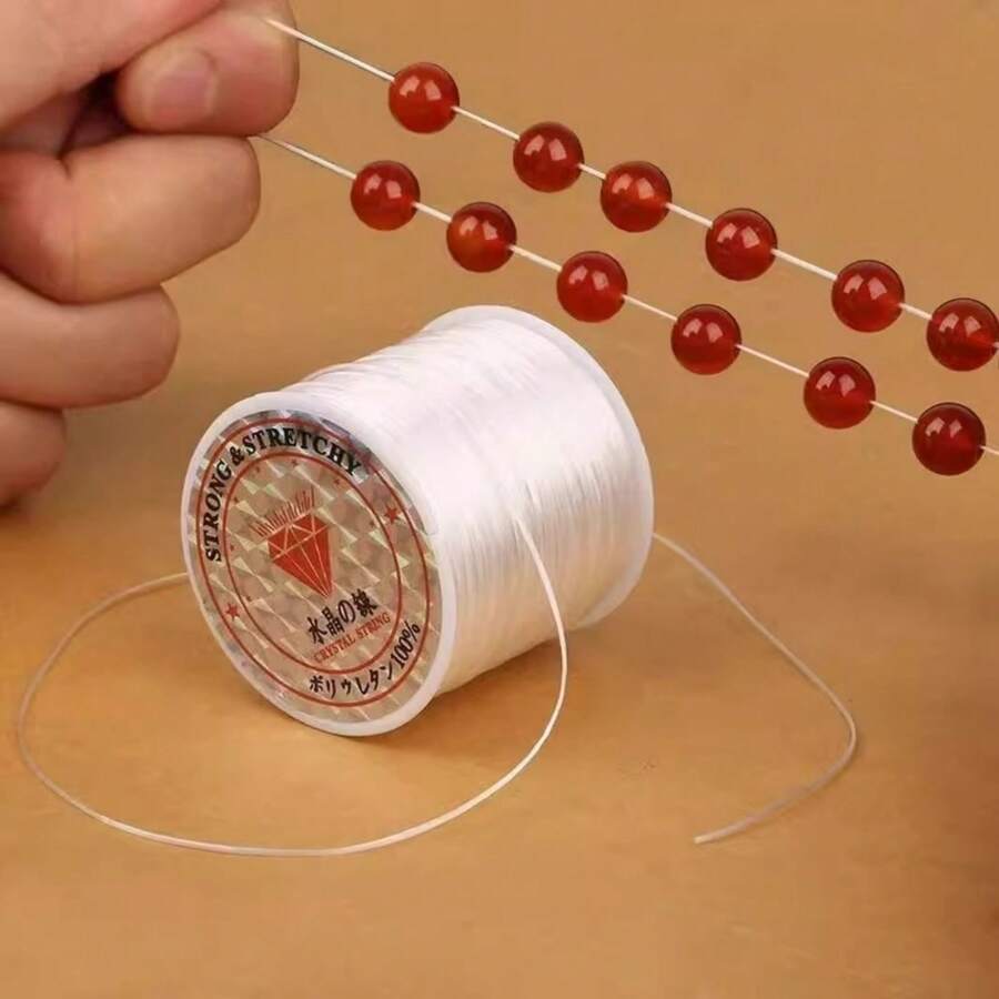 1 قطعة خيط مطاطي قوي ومطاط - 45.21 متر ، حزام مطاطي متين لصنع المجوهرات DIY ، خيط مطاطي أبيض مع خرز أحمر متوافق ، مستلزمات صناعة الأساور والعقود ، خيط لصنع الأساور ، تصميم بكرة - متعدد الألوان - مشاهدة 1