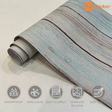 SUPSTICKER 1 rouleau (1 pièce) Autocollants pour escaliers avec motif bois clair bleu et brun clair. Décoration murale en PVC autoadhésif et amovible, avec propriétés imperméables, faciles à nettoyer et sans couture. Idéal pour les marches d'escalier, les surfaces de meubles, les sols de balcon, les sols de salle de bain et plus encore. Parfait pour la décoration de la maison et la rénovation d'espace. Plusieurs tailles disponibles.