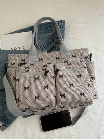 时尚简约大容量多口袋单肩托特包，适合上学、工作、旅行和商务，可斜挎