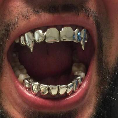1 Set de Grillz clásicos de estilo punk con seis dientes lisos en forma de colmillo, accesorio divertido para Halloween, unisex