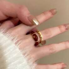 1pc Exquisite 18K Gold Plated Ring Features A Unique Irregular Flower Design With Vibrant Red Enamel Accents That Create A Striking Visual Appeal. The Open End Design Allows For Adjustable Sizing And Comfortable Stacking With Other Rings. Crafted With Premium Hypoallergenic Materials That Resist Tarnishing And Maintain Their Beautiful Appearance Through Regular Wear. The Artistic Floral Motif Combines Elegant Styling With A Touch Of Vintage Charm, Making It Suitable For Both Casual And Formal Occasions. Perfect For Adding A Pop Of Color To Your Everyday Outfits Or Making A Statement At Special Events Like Weddings, Parties, And Music Festivals. The Durable Enamel Coating Ensures Long-Lasting Color Vibrancy While Being Easy To Clean. An Excellent Gift Choice For Fashion-Forward Women Who Appreciate Unique Jewelry Designs.