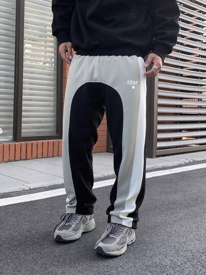 Pantalon décontracté pour hommes en patchwork bicolore, pantalon de jogging droit et ample, imprimé de lettres et d'étoiles, convient pour le printemps/automne, le port quotidien, la sortie, le style de rue