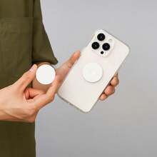 创意折叠式软垫支撑架，确保手机稳固握持，气囊式手机支架更是懒人的理想之选。兼容和安卓手机，可作为生日、家人、朋友的礼物。推拉式手机握把配件 - 黑色 - 查看 9