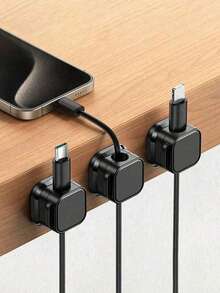 1/6/12黑白数据线收纳器,小巧的方形设计,稳固不脱落,兼容Type-C、Lightning等多种接口数据线,无需钻孔安装,不会损坏桌面。可固定在桌面、墙面等多个位置,是上班族、学生、数码爱好者的必备之选。它也是居家必备、家居装饰、圣诞节等场合的必备之选。
