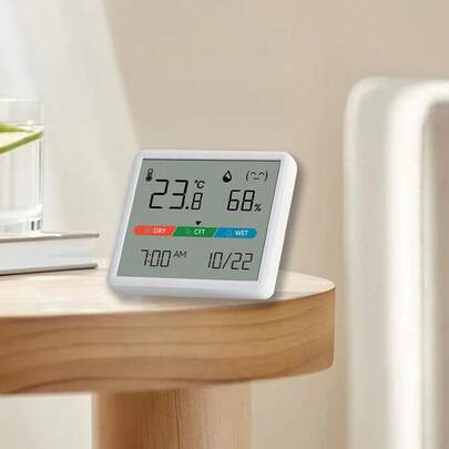 Thermomètre et hygromètre d'intérieur avec grand écran coloré, affichant clairement la température, l'humidité et les informations du calendrier. Surveille précisément les changements de l'environnement intérieur. Affichage électronique pour une visualisation facile, crée un espace de vie confortable