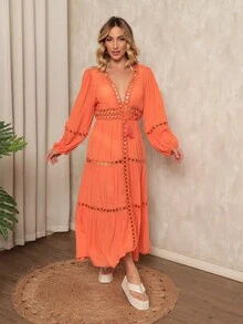 Veste esta túnica de praia e transforma-te numa deusa de férias! Com detalhes de aberturas delicados e um corte fluido, é perfeita para adicionar um toque de elegância boho ao teu look de praia, garantindo que brilles em cada momento. - Laranja - Visão 5