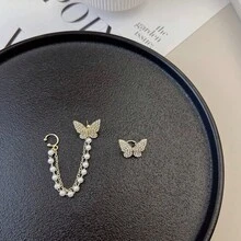 1 par de clips de oreja con cadena de borlas, cristales de imitación y perlas falsas con diseño de mariposa - Clips de oreja asimétricos de micro-cristal sin perforación para mujeres, pendientes de moda coreana para citas/fiestas, joyería hipoalergénica, regalo de Navidad, accesorios para mujeres, juego de pendientes elegantes de acero inoxidable dorado, pendientes de Navidad, accesorios de pendientes para mujeres por menos de 10 pesos