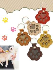 Llavero con colgante de pata de gato de cuero creativo y de dibujos animados como accesorio para prevenir la pérdida de mascotas