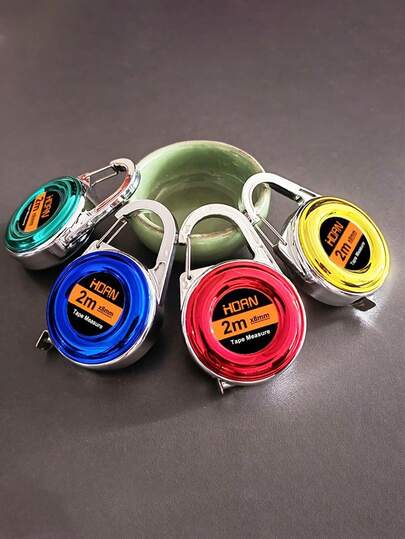 1 pieza Cinta métrica portátil de acero con llavero, mini regla ideal para proyectos de bricolaje, oficina y carpintería. Cinta métrica de 2m, pequeña regla con llavero, herramienta multifuncional. Un regalo imprescindible para la familia, cumpleaños, festivales, Navidad, accesorios para el coche, regalo para maestros, amigos, hermanas.