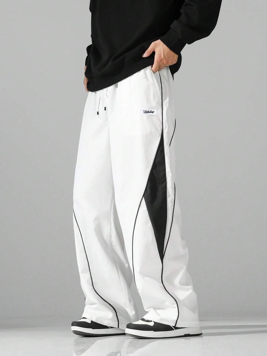 男士街头风运动裤 - 轻盈涤纶运动裤，侧边条纹，带口袋和抽绳腰带，撞色休闲运动裤，适合街头穿着、慢跑、户外休闲、健身房等场合，时尚百搭。 - 白色 - 查看 1