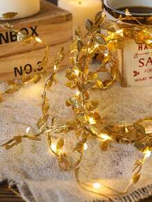 金色叶子串灯，100厘米/10颗LED灯。适用于室内装饰和节日装饰。电池供电，一套浪漫的金色叶子仙子，宛如金色箔纸装饰灯串，适合室内使用，包括餐厅、卧室和客厅。是婚礼、派对、生日和周年纪念日的完美之选。是所有季节的最佳礼物（不含电池）。 - 金色 - 查看 9