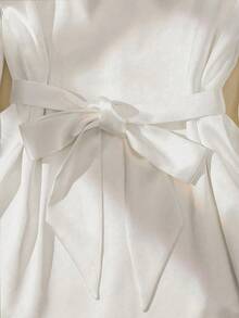 Elegant White Collared Long Sleeve Shirt For Women, Made Of Slightly Stretchy Polyester With A Belted Design And Asymmetrical Long Length