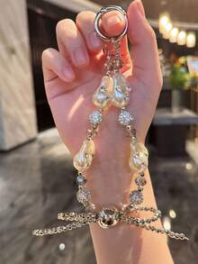 Corona de perlas falsas colgante, Lazo asimétrico de perlas falsas para correa de teléfono, Funda de teléfono con cuentas de cristal, Colgante de bolso, Llavero