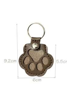 Llavero con colgante de pata de gato de cuero creativo y de dibujos animados como accesorio para prevenir la pérdida de mascotas